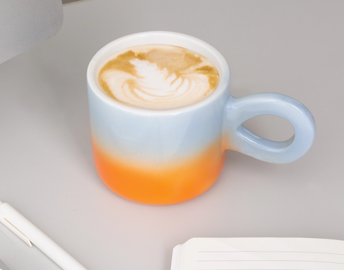 TASSE MIT VERLAUF SONNENUNTERGANG